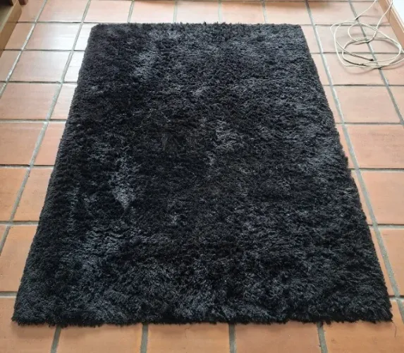 tapete preto felpudo