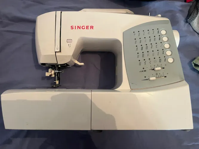 Máquina de costura singer