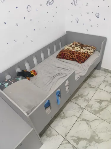 Cama infantil com escorregador