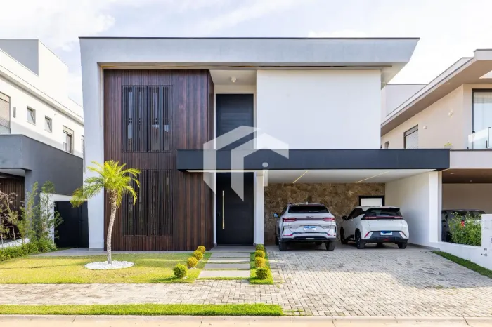 CASA À VENDA COM 5 SUÍTES MAIS LAZER NO CONDOMÍNIO ARBORAIS.