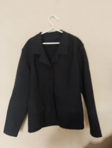 Blazer preto feminino. Griffin Confecções. Corte despojado. Tamanho 36. Sem forro.