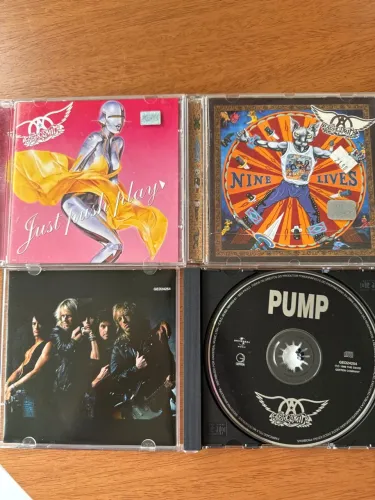 CDs Aerosmith - Just Push Play, Nine Lives e Pump bitencom 