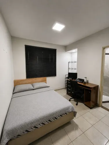 Suíte em apartamento na Praia do canto