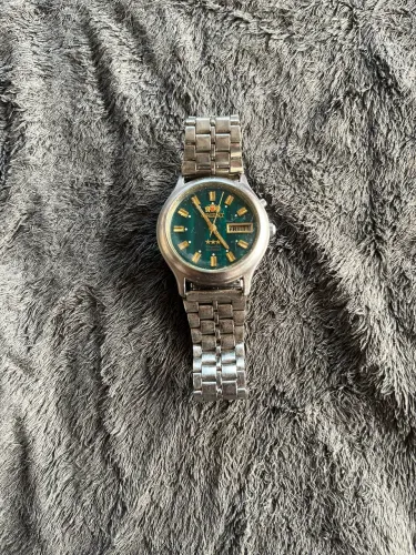 Relógio orient automático cristal três estrelas mostrador verde bem conservado