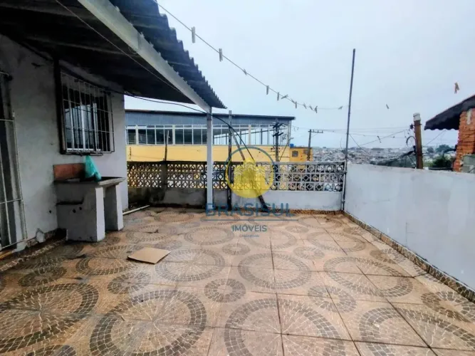 Casa para venda em área comercial com terreno