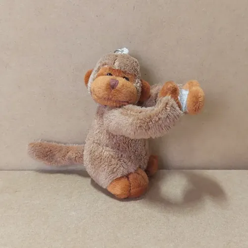 brinquedo - pelúcia chaveiro macaco agarradinho