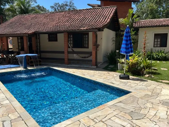 Casa com piscina e área gourmet à venda no Guaratuba Residencial  Bertioga/SP
