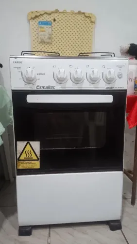 Vende fogão 4 bocas Esmaltec semi novo