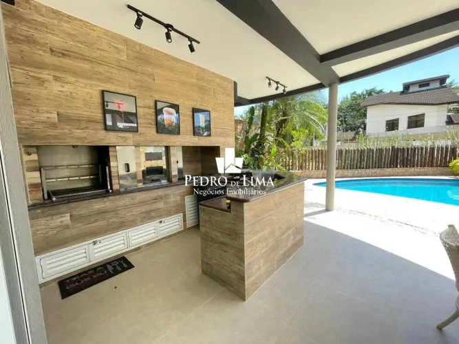 Casa com 5 dormitórios à venda, 434 m² por R$ 7.500.000,00 - Riviera Módulo 21 - Bertioga/