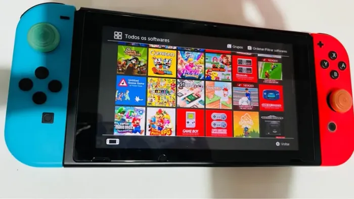 NINTENDO SWITCH V1 DESBLOQUEADO 100%, COM CARTAO SD CHEIO DE JOGOS E PRO CONTROLLER