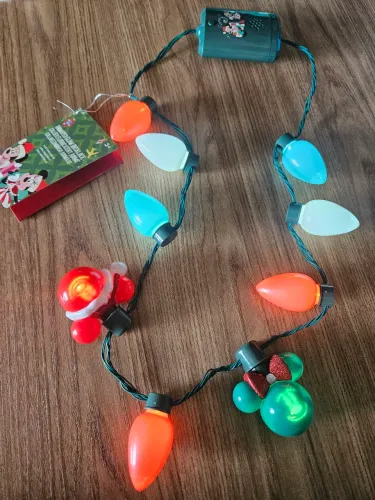Colar musical luminoso de Natal Disney