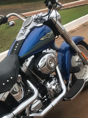 Sem detalhes, pneu meia vida acima, bateria nova original.