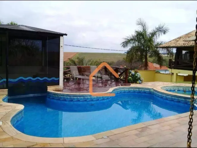 Casa com 4 dormitórios à venda, 660 m² por R$ 1.390.000,00 - Jk - Pouso Alegre/MG
