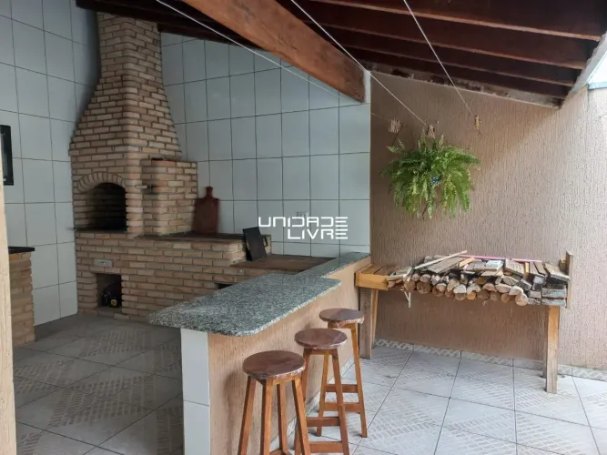 Sobrado Residencial Rubi - Churrasqueira com Área de lazer 127m²