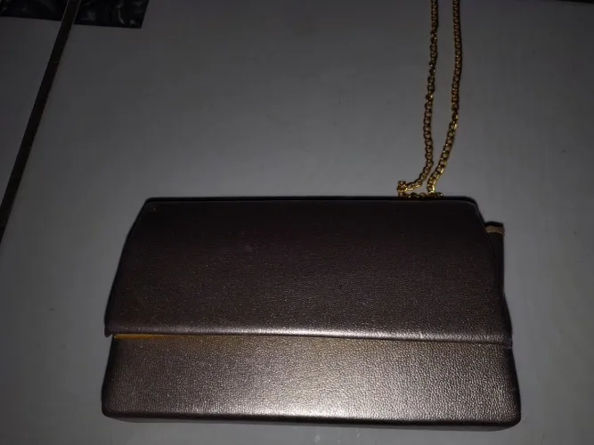 Bolsa de festa dourada