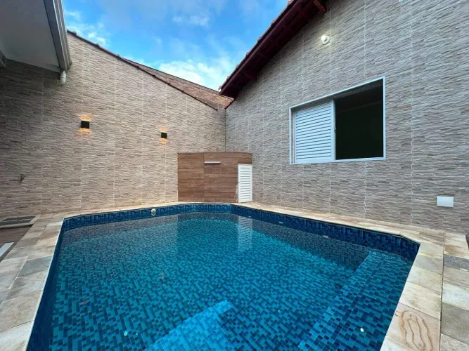 Casa com piscina, área gourmet e 4 dormitórios à venda, 195 m² por R$ 1.262.000 - Ocian - 