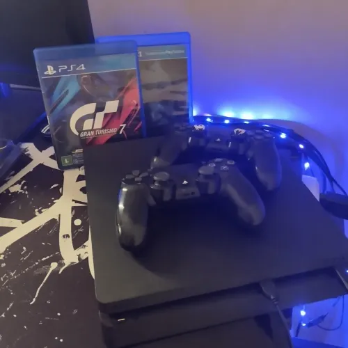 PlayStation 4 com dois jogos the last ofus partes 2 Gran turismo 7 2 controles com drift