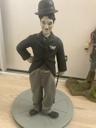 Estatueta Charles Chaplin