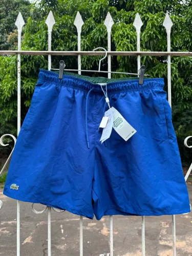 BERMUDA SHORT LACOSTE TECTEL SPORT AZUL