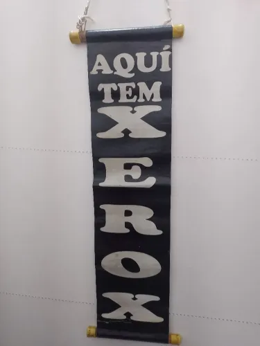 Vende se placa Aqui tem xerox