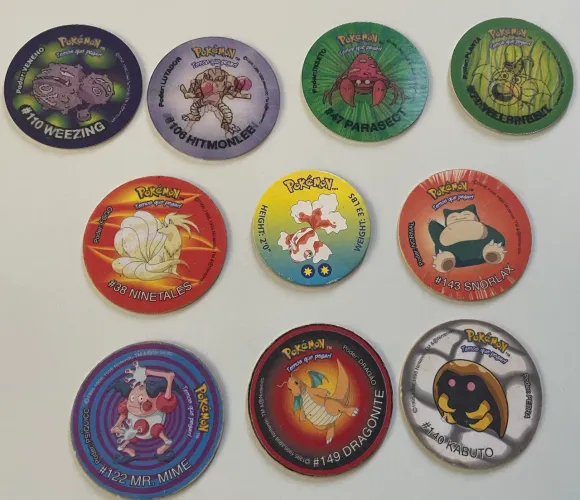 Lote Premium 10 Tazos Pokémon Elma Chips - Dragonite #149, Snorlax e Holográficos