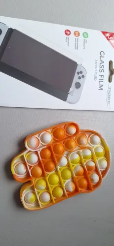 Película pra Nintendo Switch + Pop it Among us de extra