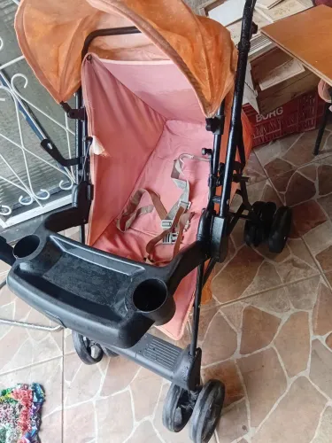 Carrinho bebê e bolsa