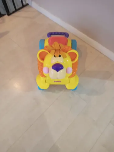 ANDADOR LEÃO MUSICAL FISHER PRICE