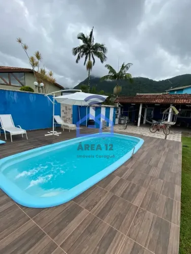 Casa com piscina à venda no condomínio Mar Verde, bairro da Tabatinga em Caraguatatuba, SP