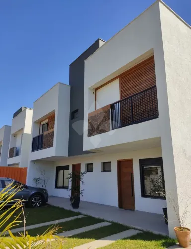 Casa 3 dormitórios em condomínio na Praia do Rosa em Imbituba-SC
