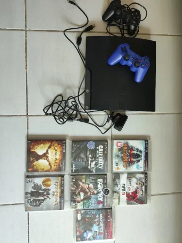 PS3 Slim + jogos