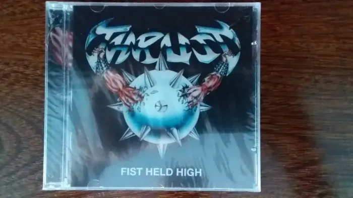 cd thrust fist held high