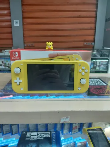 Nintendo Switch Lite Desbloqueado (Muito Conservado!) Cartao de 128GB Lotado de Jogos!!!