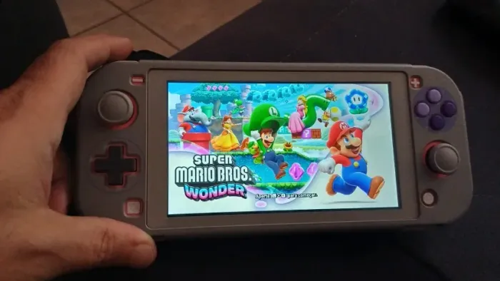 Nintendo Switch Lite desbloq., troco por PS Portal