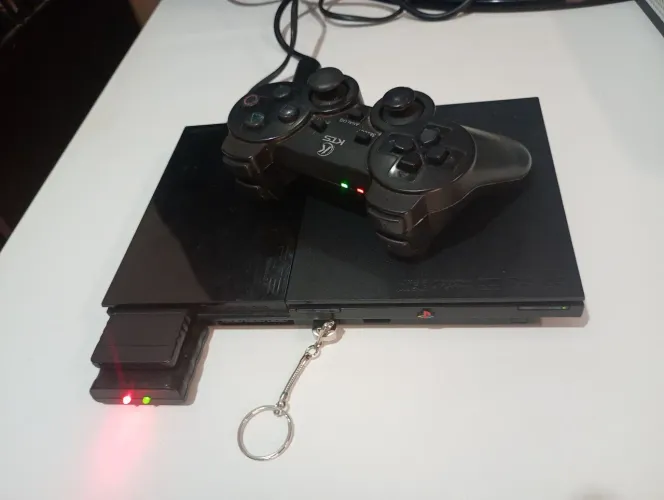 Playstation 2 com leitor cansado