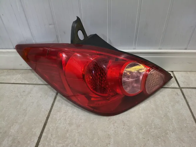 Lanterna Traseira Esquerda Nissan Tiida Hatch 2008-2013 Original 