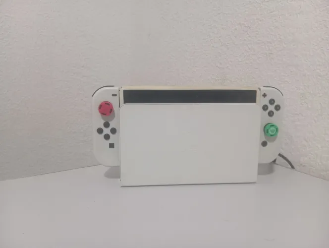 Nintendo Switch OLED 64gb + 128gb