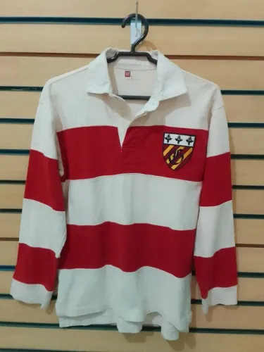 Camiseta Polo listrada Gap Infantil.