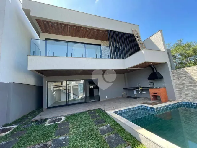 Casa com 4 quartos e 4 suítes à venda, 202 m² por R$ 1.590.000 - Recreio dos Bandeirantes