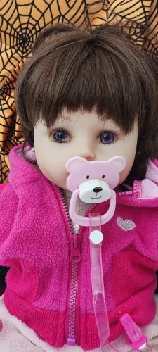 Boneca Reborn com Roupa e Chupetinha