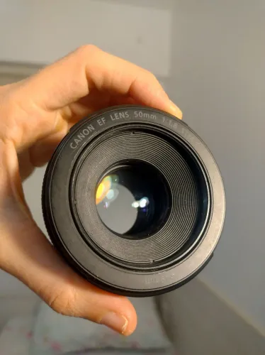 Lente Canon EF 50mm f/1.8 STM<br>R$ 921,50<br>Amazon.com.br<br>Grátis