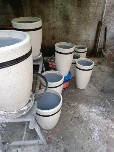 Vasos de planta fibra com cimento 