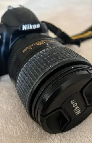 Camera Nikon D3100 com lente 18-300