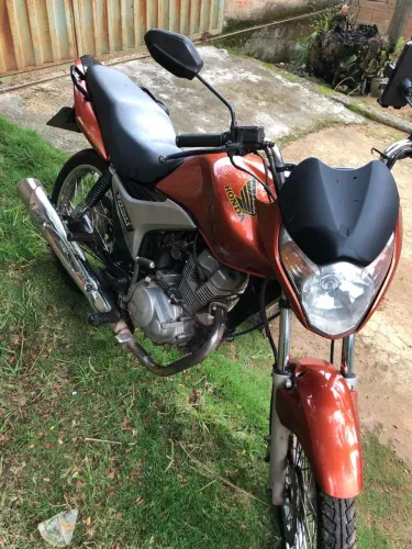 Moto em perfeito estado de conservação,