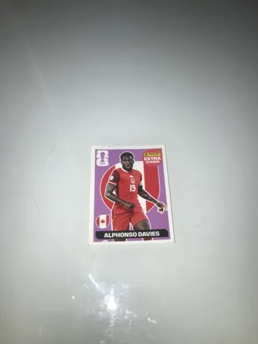 Figurinha alphonso davies legend roxo regular 