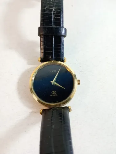 relógio gucci vintage sherry line dourado