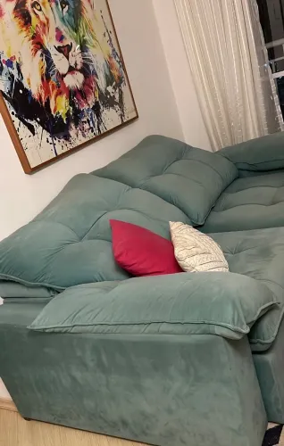 Sofá azul reclinável