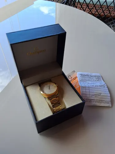 Relogio Champion Dourado Unissex