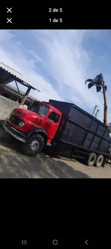 Caminhão garra sucateira