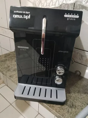 Vendo purificador de água New. Up semi novo, ele é com compressor